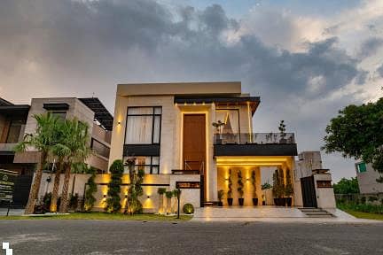 SYED BROTHERS PROUDLY OFFERS: 1-Kanal Elegant And Fully Furnished Modern Bungalow with Basement Is Available In The Best Block Of DHA Lahore.