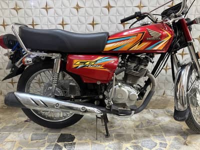 HONDA 125 colour red