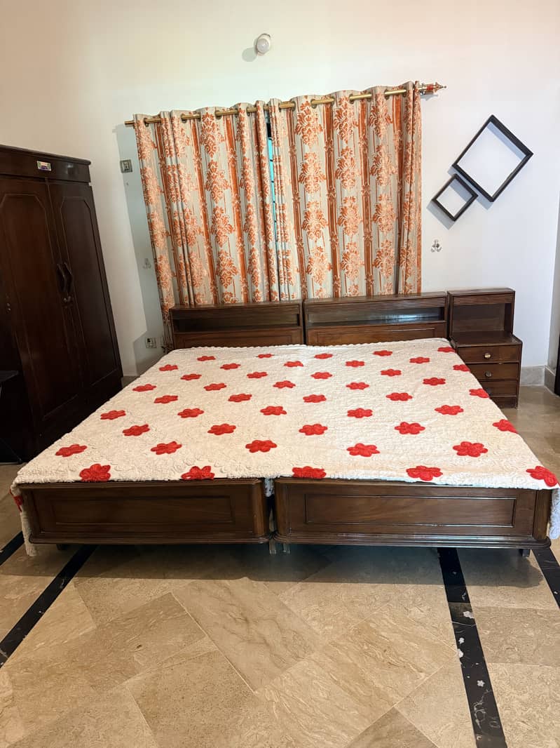 2 single bed with center side table 3
