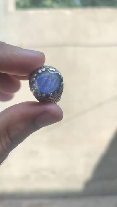 Neelam Blue Sapphire 12 KT Silver Ring
