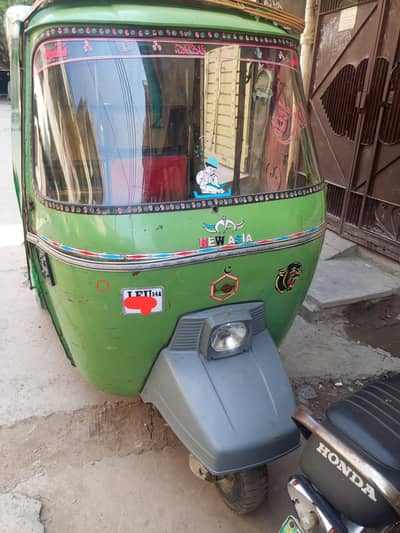 نیو ایشیا فور سٹوک رکشہ