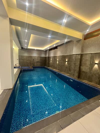 FOR SALE: BRAND-NEW 500 SQ YD TWO-UNIT LUXURY BUNGALOW WITH BASEMENT & POOL PRIME DHA PHASE 5, KARACHI