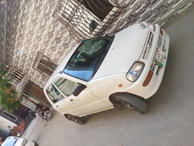 Daihatsu Cuore 2006 Total genuine. only two pieces minor touching