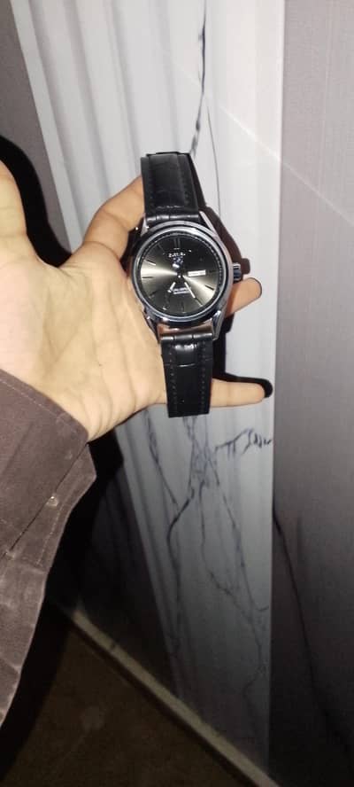 CARRERA brand watch and water resistant with leather master belt