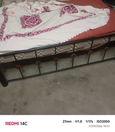 Iron bed with mattress