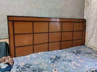 beautiful wooden double bed