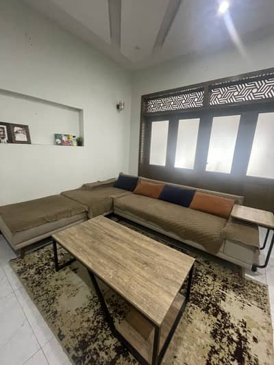 Habitt L shaped sofa and centre table 70000