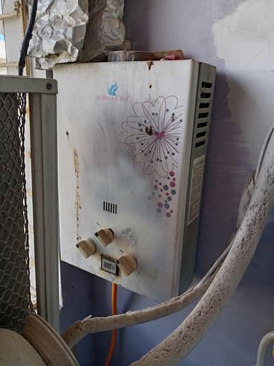 Instant gas water heater.