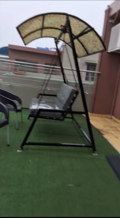 Rod iron outdoor swing