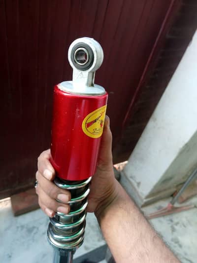 70 rear shock 1 month use  munasib rate