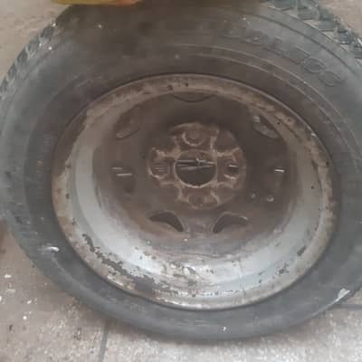 SUZUKI CULTUS MODEL 2002 SPARE WHEEL WITH STEPNY AND TUBE IN USED CON