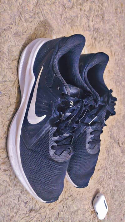 Original Nike /Running Shoes. Black and white,(slightly used)