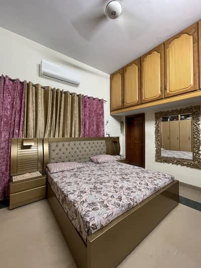 Bed with side tables