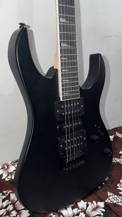 Electric guitar with amplifier