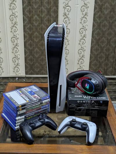 PS5 Disc Edition + 2 Controllers + 8 Games + Ozeino OWS310 + Box