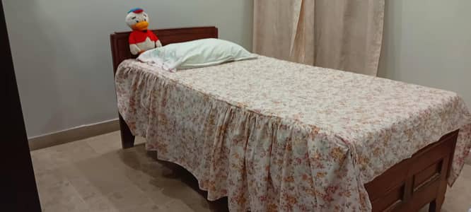 2 Single wooden beds with original Molty Foam Mattresses Available