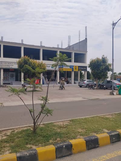 5.33 MARLA COMMERCIAL PLOT ON PRIME LOCATION WITH 50 WIDE PARKING SPACE AVAILABLE FOR SALE IN NEW LAHORE CITY PHASE 2 MAIN BOULEVARD 150 FEET ROAD