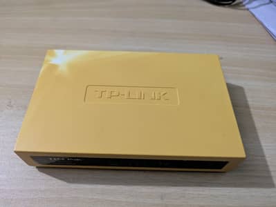 Tp link Router with adapter and cable