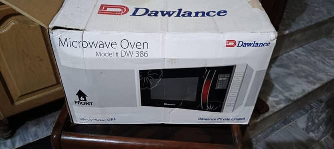 Dawlance DW-386 microwave oven in very good working condition.