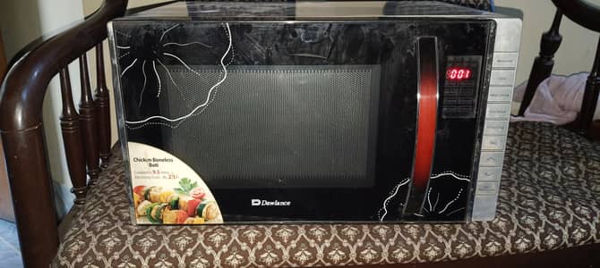 Dawlance DW-386 microwave oven in very good working condition.