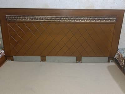 king size bed with side table