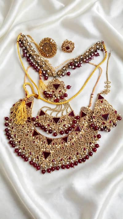 Bridal artificial set 1time used red & golden color