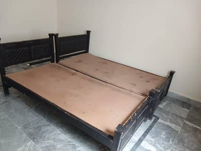 Wooden 2 single bed