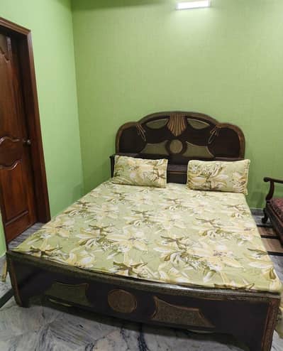 Elegant Dark Polish Wooden Double Bed with Built-in Side Tables