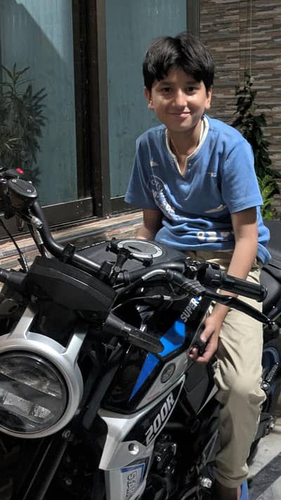 supperstar 200R special addation۔ neat and clean bike