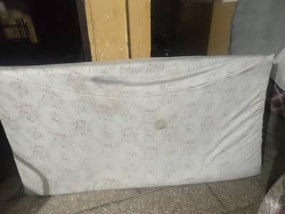 bed metress and TV trolley