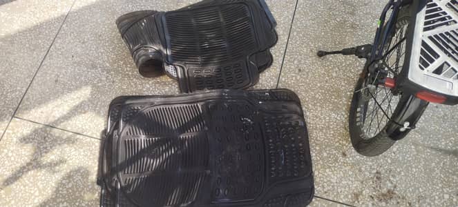 2 sets of carolla car mats