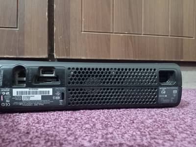 Xbox 360 Jasper with [ a controller , power supply , and cables ]