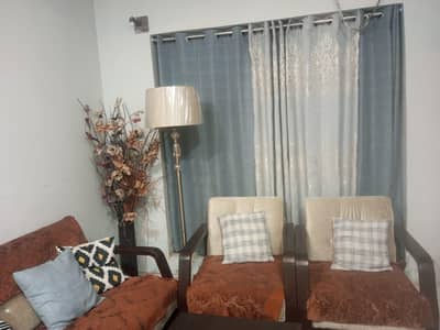 5 seater sofa with glass table