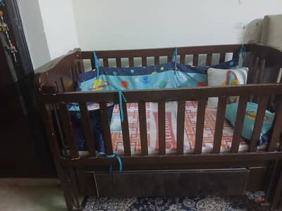 Baby cot for sale used only thrice with mattress and a minie minor be