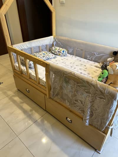 Handmade wooden baby cot
