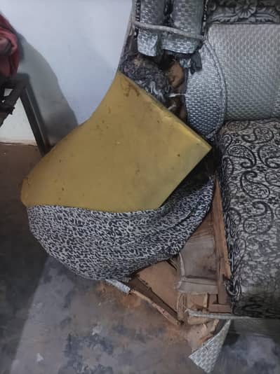 Damaged sofas for sale.