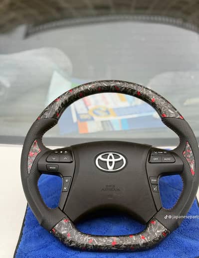 Toyota corolla original carbon steering and multimedia