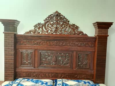 King size wooden bed in good condition.