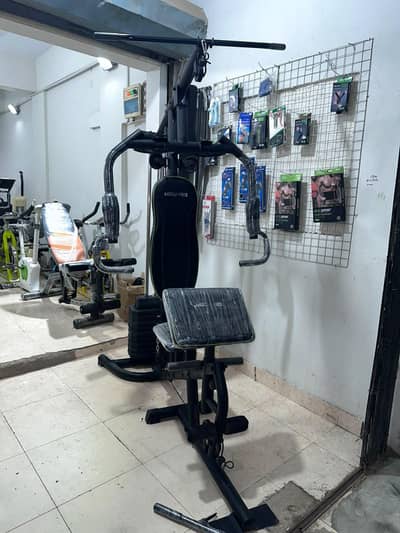 Exercise ( American fitness 7080 home gym) multiple exercises