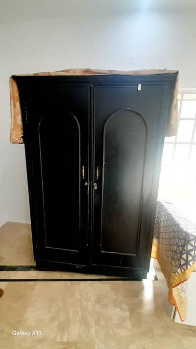 condition is 8/10 in pure wood frame wardrobe for urgent sale.