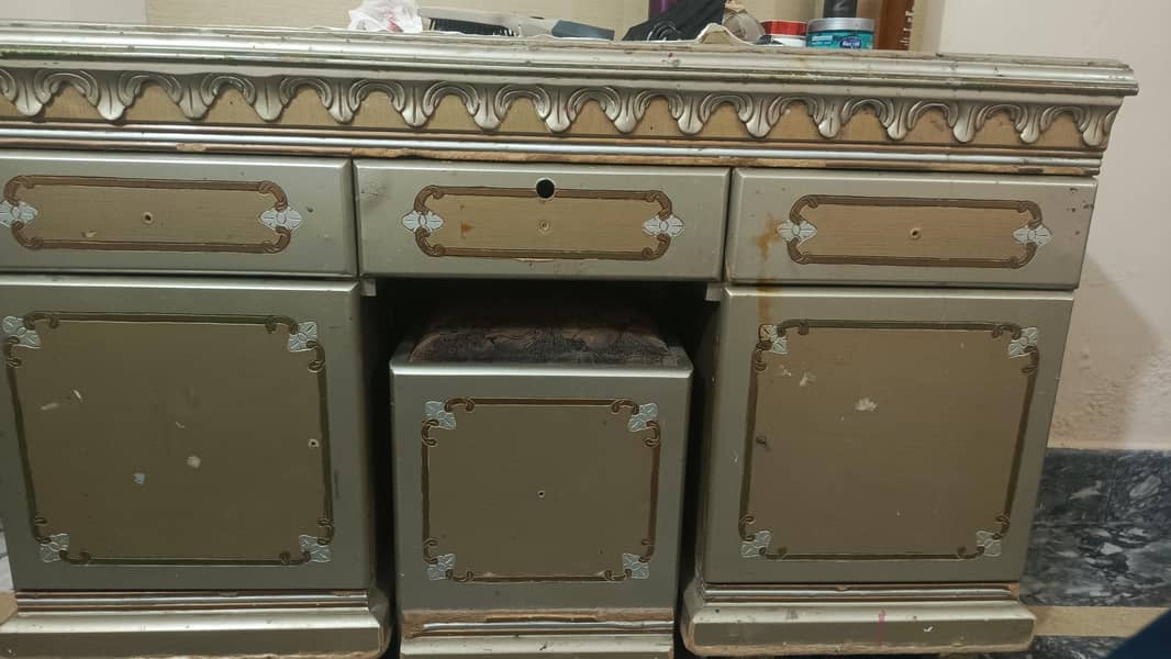 a bed with dressing table and side table 3