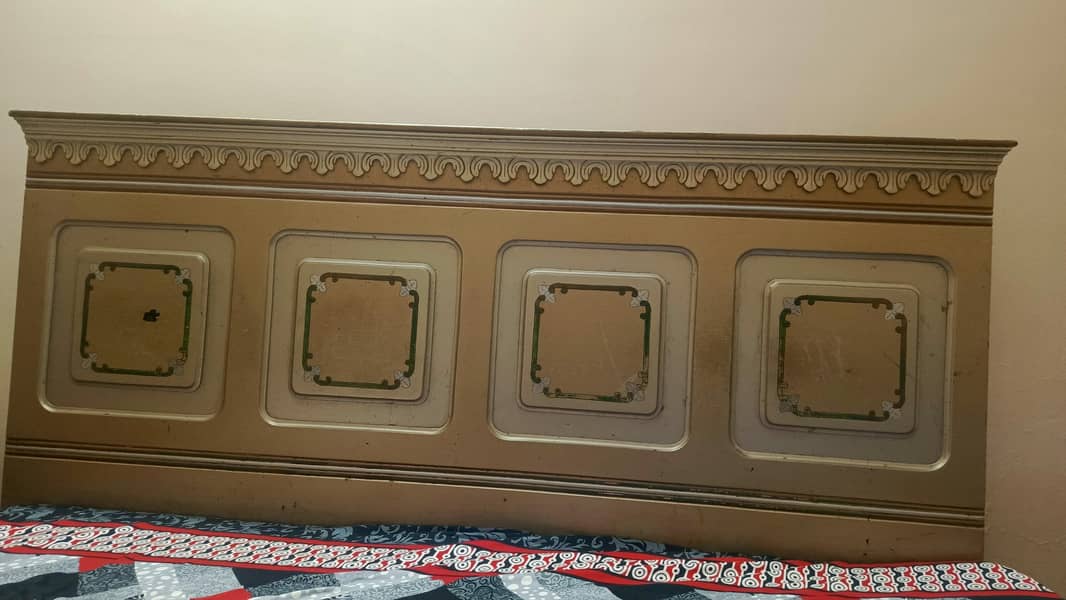 a bed with dressing table and side table 5