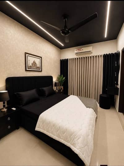 ONE BED LUXURIOUS FURNISHED APARTMENT FOR SALE AT HOT LOCATION OF BAHRIA TOWN LAHORE