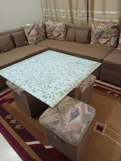 L shape sofa glass top table