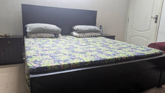 Wooden Bed with side tables slightly used but still good and solid