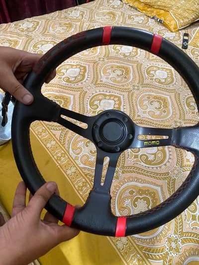 Deep Dish Steering wheel and straight pipe exhaust