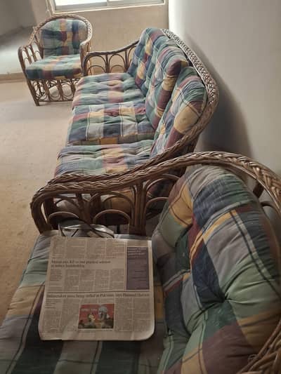 cane sofa