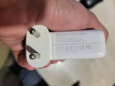 Mac book or iphone charger adapter