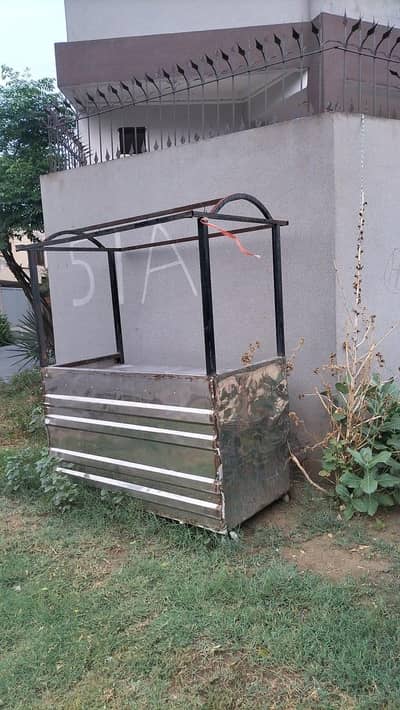 steel Counter with iron pipe frame.