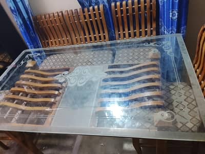 wooden dinning table with six chairs